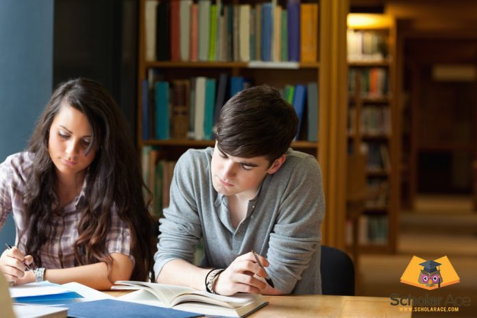 students writing research case study in library