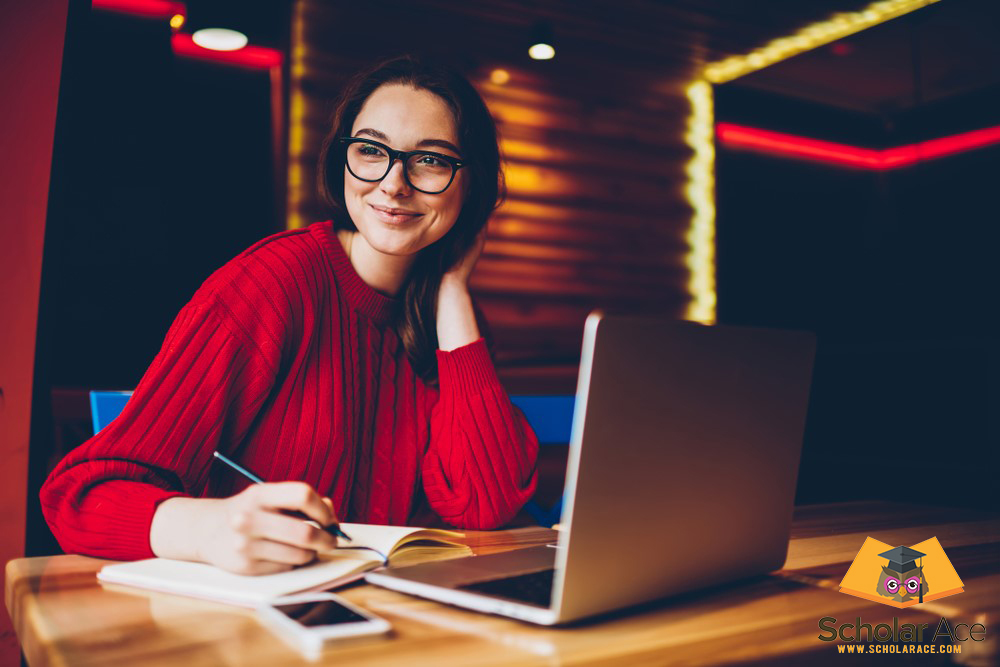 Girl studying in UK with laptop