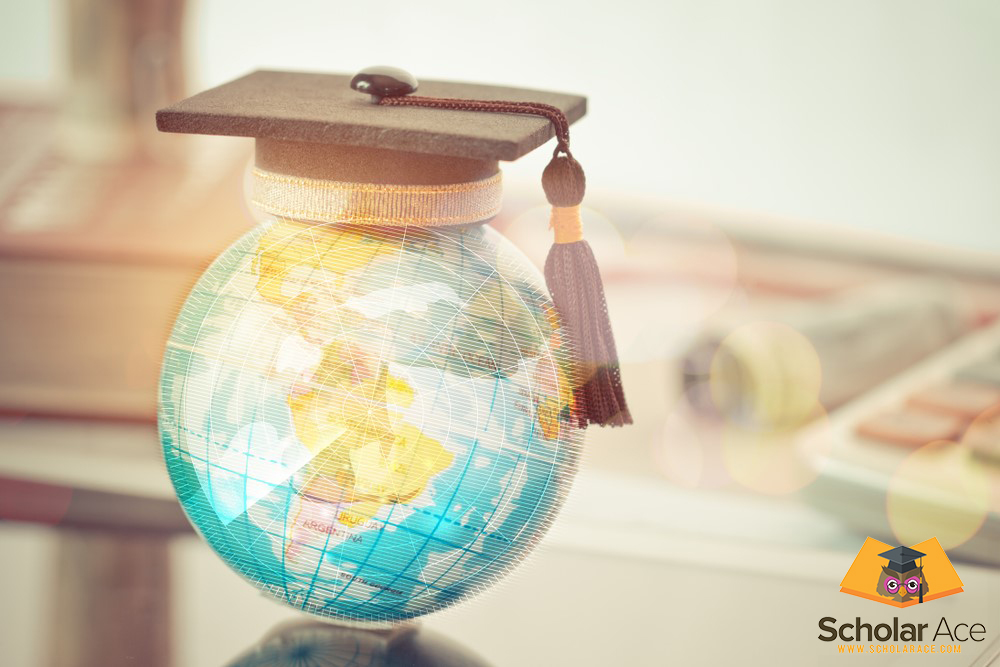 graduation hat over globe